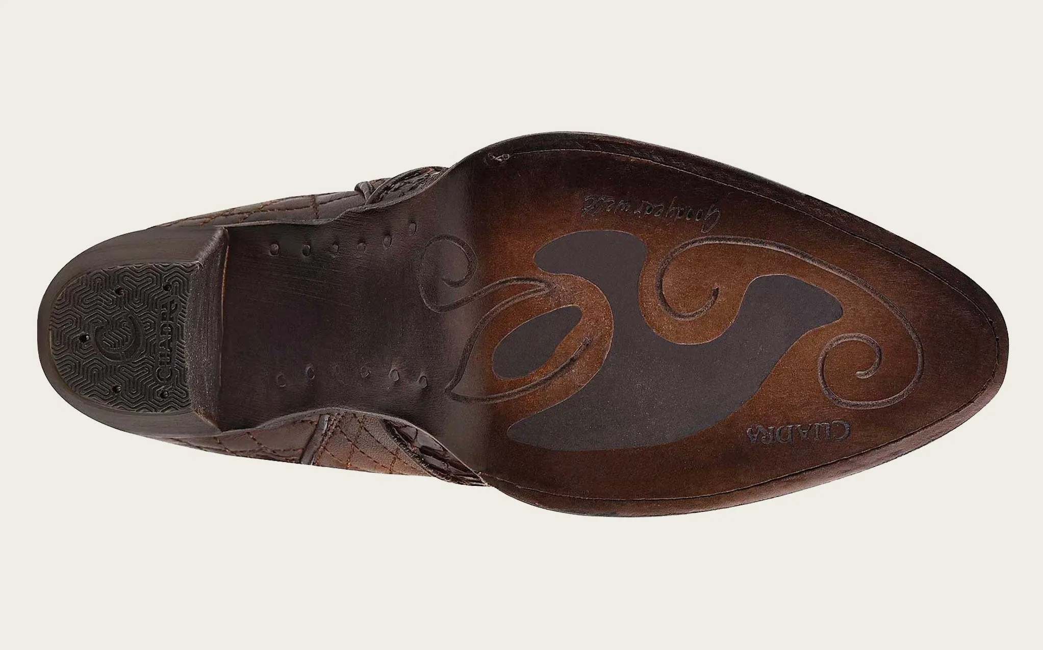 Tall engraved brown exotic boot